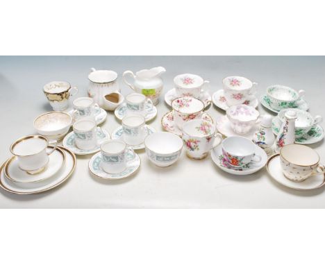 A large collection of 19th century Victorian and later mixed china tea cups and saucers to include Coalport, Royal Albert Cot