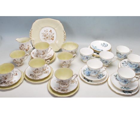 A 20th century six person tea set by Royal Adderley in the Terra Nova pattern comprising of six cups, saucers and cake plates