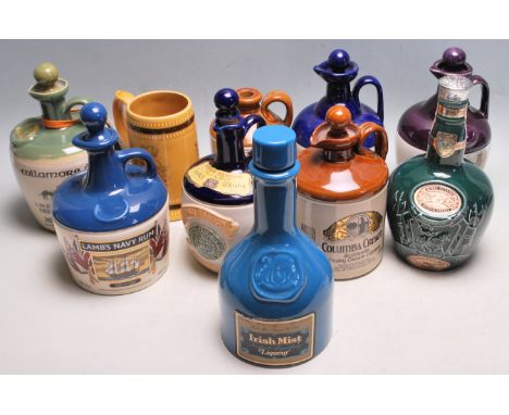 A good collection of early 20th century and later breweriana pub advertising ceramic jugs to include Irish Mist Liqueur, Chiv