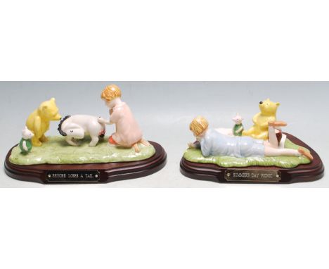 The Winnie The Pooh Collection - Royal Doulton - two boxed ceramic figurine groups - WP15 ' Eeyore Loses A Tail ' and WP21 ' 