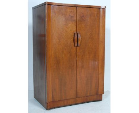 An early 20th Century 1930's antique HMV His Master's Voice mahogany cabinet having a hinged lid with fully appointed record 