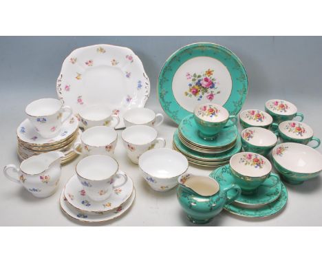 A six person tea set by Adderley in Chintz pattern comprising of six cups, saucer and cake plates, creamer jug, sugar bowl. A