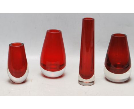 A collection of four retro vintage Whitefriars studio art glass comprising three ruby bud vases number 9657 together with a r