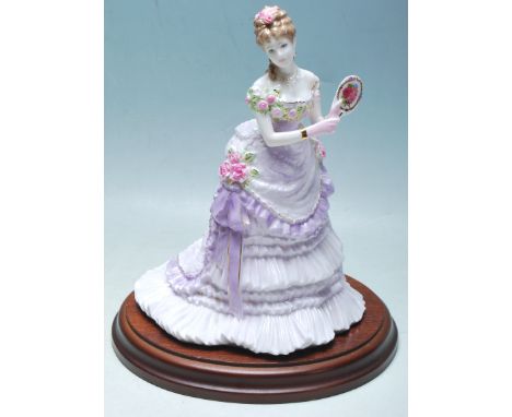 A Royal Worcester bone china figurine in the “ Splendour At Court” collection issued in a limited edition of 12500 No. 1987 m