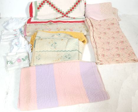 A collection of vintage mid to late 20th century Welsh textiles / blankets / double bed spread of various colours and sizes.&