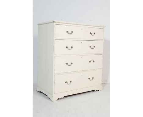 A late 19th century Victorian painted shabby chic two over three chest of drawers having brass swing handles raised on bracke