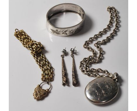 A group of antique Victorian jewellery to include a a silver hinged bangle engraved with roses, a pendant locket collar neckl