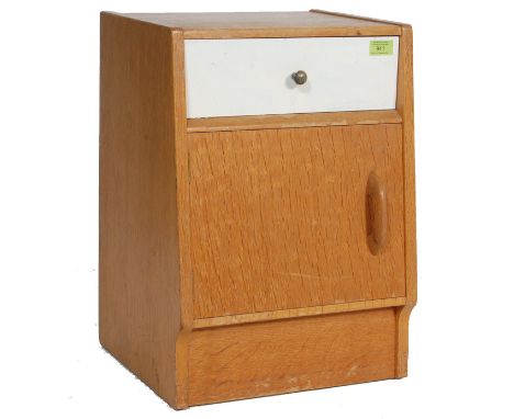 E. Gomme- G Plan- Brandon Range- A retro 20th Century G Plan light oak pedestal bedside cabinet with single drawer over a sin