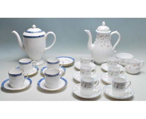 A vintage late 20th century Royal Worcester Forget Me Not coffee service comprising of cups, saucers, coffee pots together wi