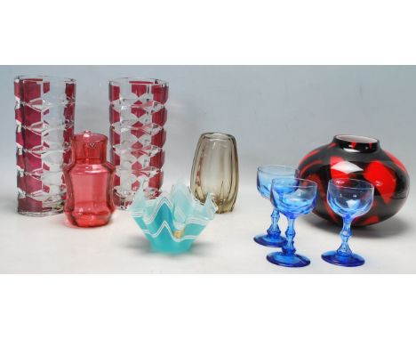 A collection of retro vintage late 20th century studio art glass to include a Whitefriars vase, large pair of French ruby fla