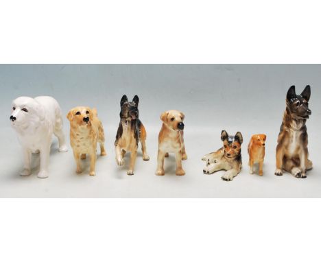 A collection of late 20th century seven ceramic dog figurines comprising of Beswick, Crown Bavaria and others. The collection