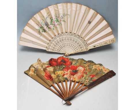 A late 18th / early 19th Century Georgian ivory and silk fan having sixteen ivory sticks with pierced decoration, the silk be