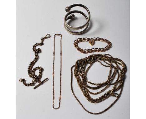 A group of antique Victorian gilt jewellery to include to include two long guard chains, a gilt heart lock bracelet, a gradua