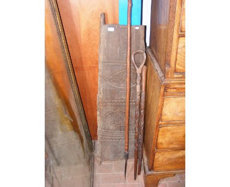 An African Tonga door, Zimbabwean spear etc.