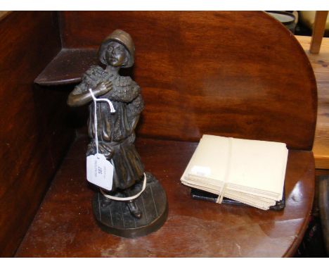 A vintage Stereoscope Viewer, complete with world tourist scenes, together with a bronzed Irish figurine 