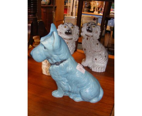A Sylvac 1209 blue Terrier dog, together with a pair of Staffordshire mantelpiece dogs 