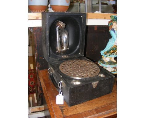 A portable wind up gramophone made by Decca