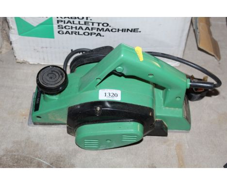 A Hitachi RS535-988 electric planer with original box 