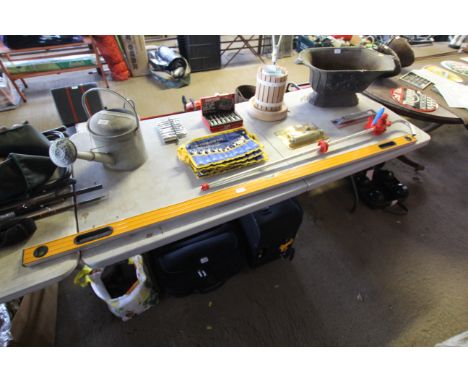 A large spirit level measuring approx. 6' long