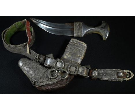 A Middle Eastern silver mounted jambiya dagger, 16.5cm curved double-edged blade, horn hilt, 29cm long overall, the scabbard 