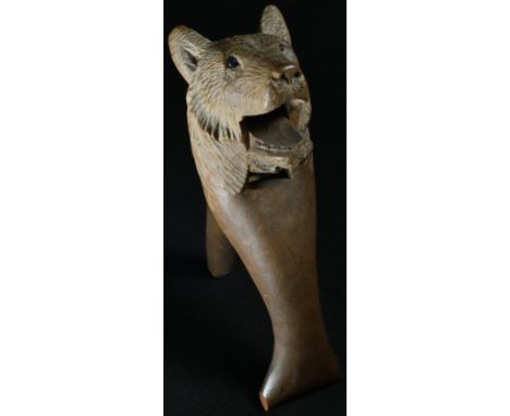 A Black Forest novelty lever-action nut cracker, carved as the head of a bear, 16cm long, c.1900 