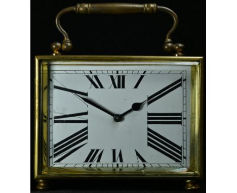 An early 20th century brass rectangular desk carriage clock, 8.5cm rectangular enamel dial inscribed with Roman numerals, eig