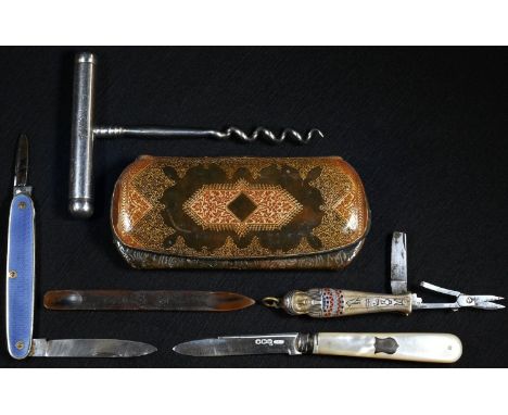 An Egyptian Revival gentleman's novelty combination knife, as a Ancient Egyptian mummy sarcophagus, picked out in tones of bl