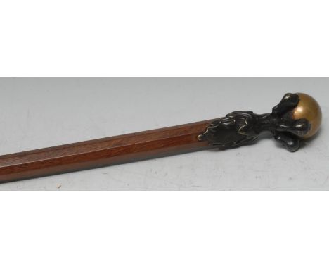 A bronze mounted gentleman's walking stick, as an eagle's claw grasping a ball, tapered octagonal cane, 106cm long 