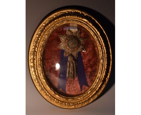 An early 19th century Court sash, of the 'Garter Star' and ribbon, embroidered in coloured threads, silvered threads and sequ