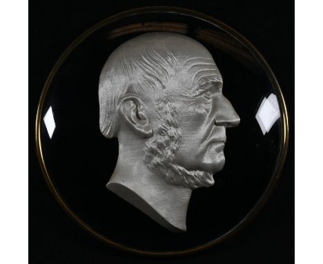 A late 19th century spun silk portrait roundel, of William Ewart Gladstone, 17.5cm diam, c.1890 
