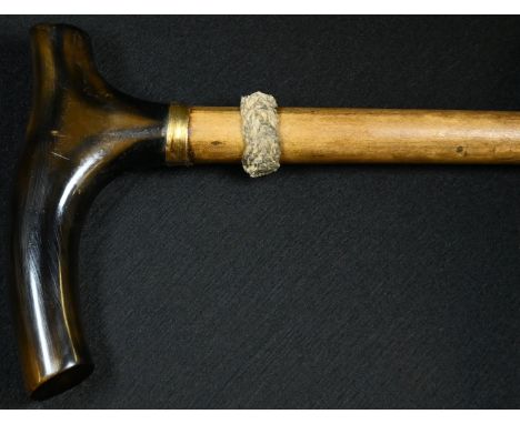 A 19th century marine bone walking stick, the shaft possibly a whale rib, serpentine L-shaped tortoiseshell handle, gilt meta