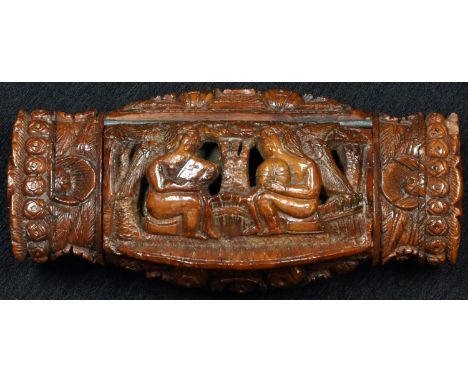An early 19th century coquilla nut snuff box, carved with figures, flowers and stiff leaves, hinged cover, 9cm wide, c.1820 