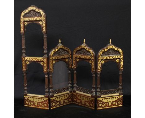 A 19th century Orientalist mahogany and brass marquetry quadriptych graduating photograph frame, in the Moorish taste, each a