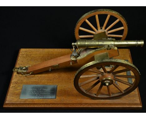 A scratch-built desk model of a field gun, by A T Underwood B.E.M, engraved plaque inscribed 'This Model of a British Light 6