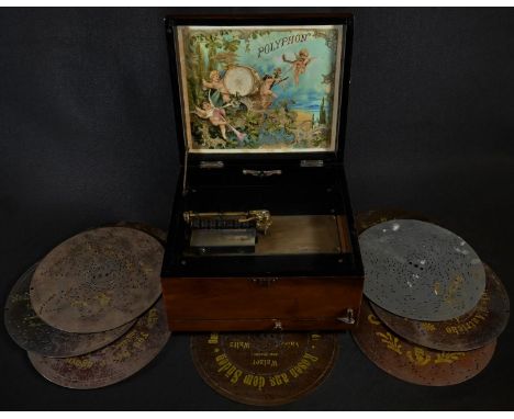 Mechanical Music - a 19th century inlaid walnut table-top polyphon, hinged cover line inlaid surrounding a vacant cartouche ,