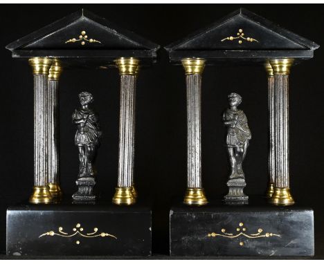 A pair of 19th century noir Belge library porticos, each with architectural pediment above a Classical figure flanked by reed