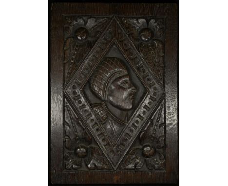 A North European oak panel, carved with a bust length portrait of a lady, within a lozenge, acanthus bosses to angles, 38cm x