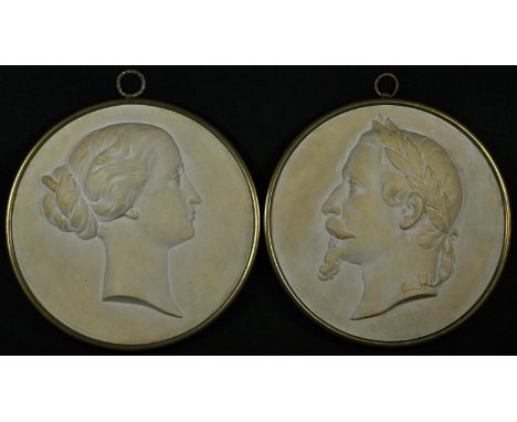 A pair of French plaster portrait roundels, after Jules-Constant Peyre, Napoleon III and Empress Eugenie, in profile to dexte