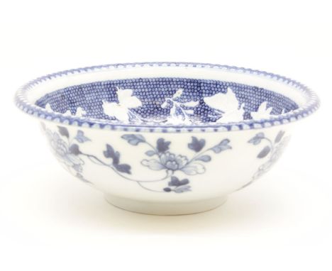 An 18th century Chinese blue and white porcelain bowl, with low relief butterfly and foliate design, 25cm diameter