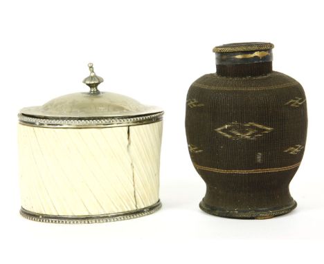 An ivory and silver plated oval tea caddy, 19th century, 10cm wide, and a wicker mounted caddy