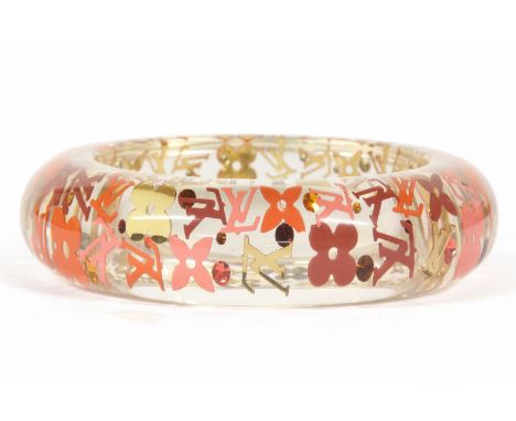 A Louis Vuitton monogram inclusion GM bangle, transparent resin band embedded with LV monogram, symbols and coloured cubic zi