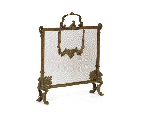 A cast fire screen, with lion and swag raised on claw feet, 78cm wide x 87cm high