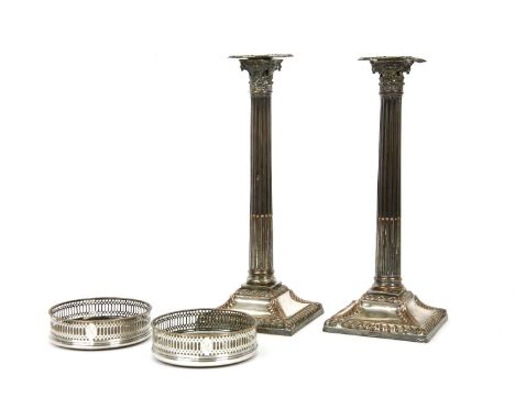 A pair of Sheffield plate Corinthian column table candle sticks, by Thomas Low, 35.5cm tall, together with, a pair of silver 