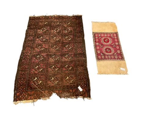 Afghan rug, the field decorated with rectangular panels with stylised plant motifs (165cm x 112cm), and a small Persian mat, 