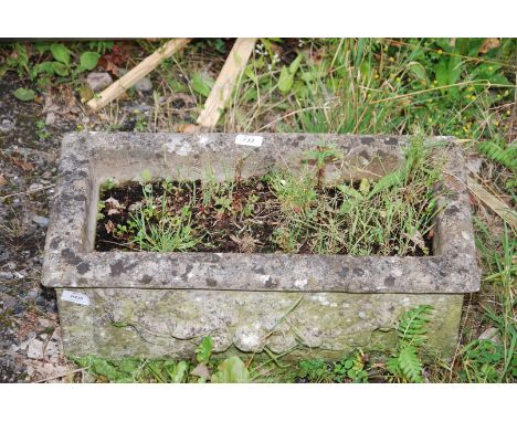 An oblong planter with fruit and lion mask pattern, 22 1/2" long x 11 1/2" wide).