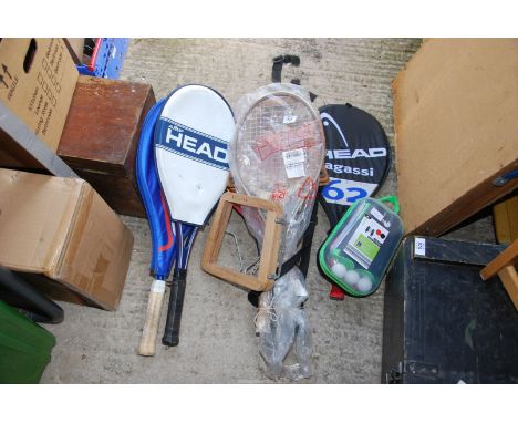 A quantity of tennis Rackets including 'head' Slazenger, Dunlop, etc, plus a table tennis set.