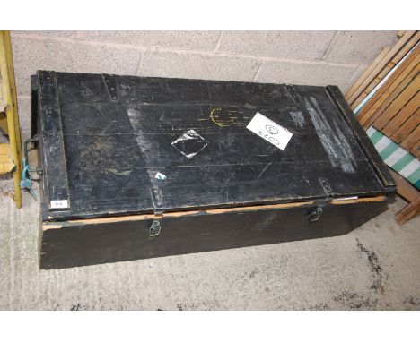 A large wooden trunk containing camping equipment including; tents, lamps, mess tins, etc.