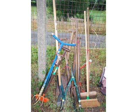 Large quantity of garden tools - forks, shovel, loppers, brushes, saw, etc.