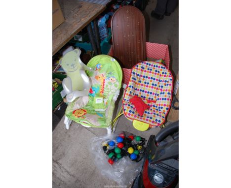 A baby bouncer, Bagatelle board, fairy lights, etc.