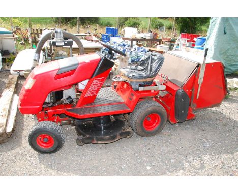 A Countax ride-on Mower K14 with belt driven rear grass collector box. Powered by 14Hp  v-twin OHV petrol engine, (key start)